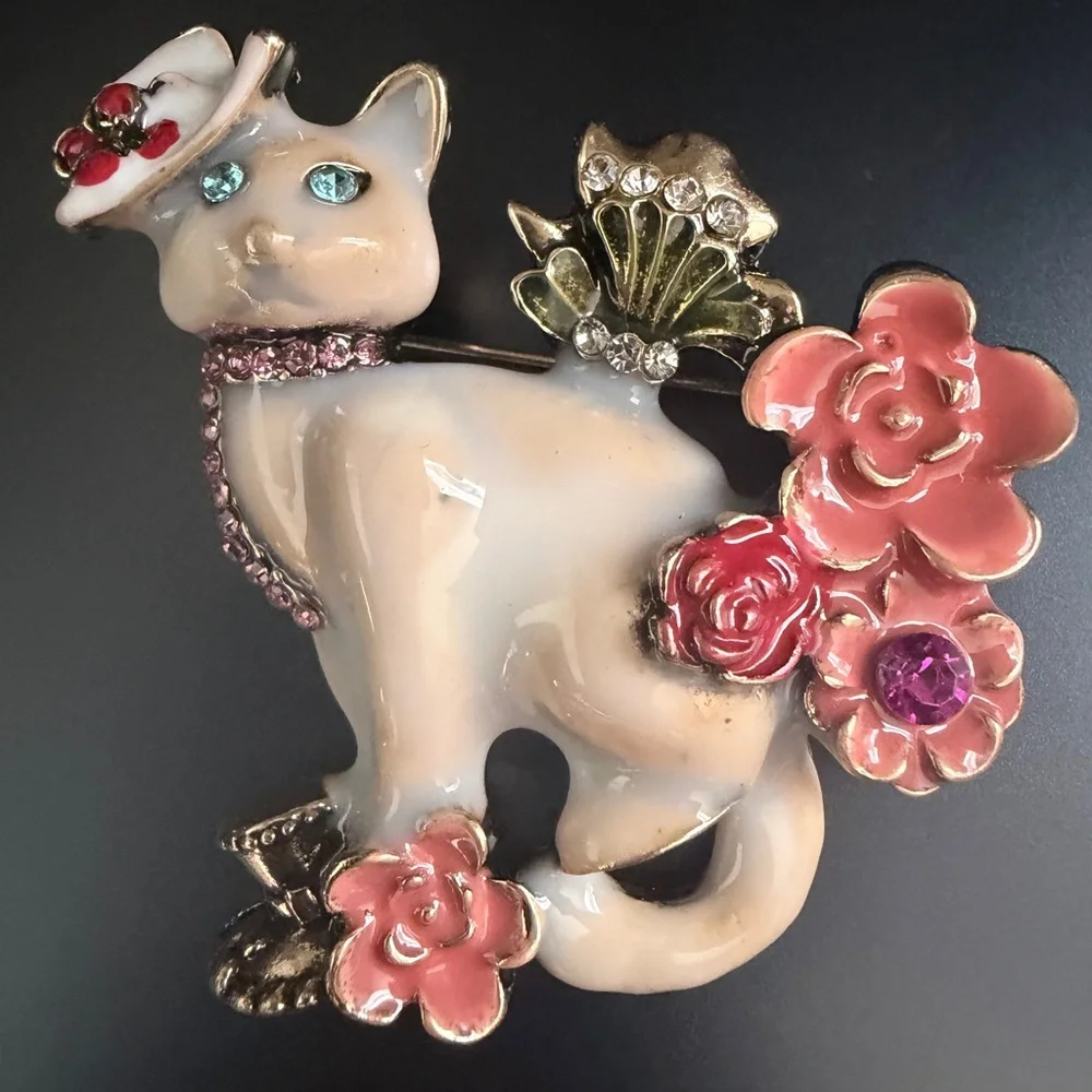 Elegant White Cat Brooch with Pink Floral Accents